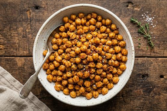 Roasted chickpeas in a bowl with smoked paprika - iron-rich pregnancy snack